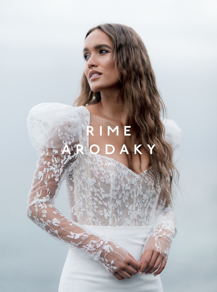 Fashionable bride with large straw hat lace cover up on yacht - Greg Finck  Photography